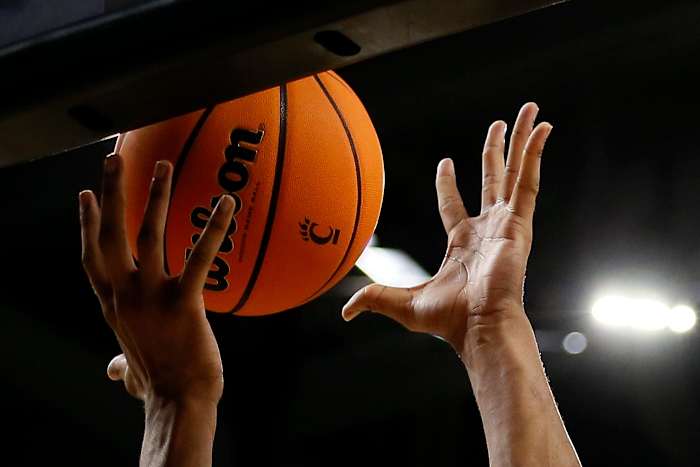 Tennessee Tech Golden Eagles forward Kenny White Jr. (13) collects a defensive rebound in the second half of the NCAA basketball game between the Cincinnati Bearcats and the Tennessee Tech Golden Eagles at Fifth Third Arena in Cincinnati on Tuesday, Dec. 21, 2021. Cincinnati finished its non-conference schedule with a 76-67 win over the Golden Eagles. Tennessee Tech Golden Eagles At Cincinnati Bearcats Basketball